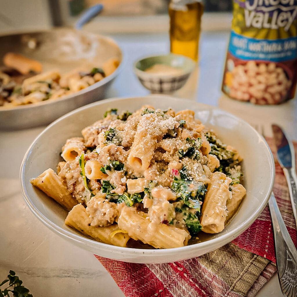 Rigatoni with Spicy Sausage, Kale & Creamy Great Northern Bean Sauce cc